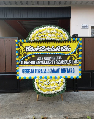 Papan Bunga Duka di Gomong